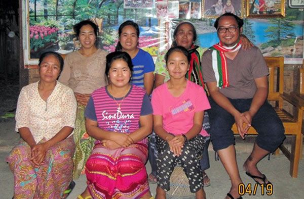 Fr. Kurt is in back row, right, wearing a colorful scarf