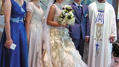 Fr. Kurt Zion Pala with his sister and her husband